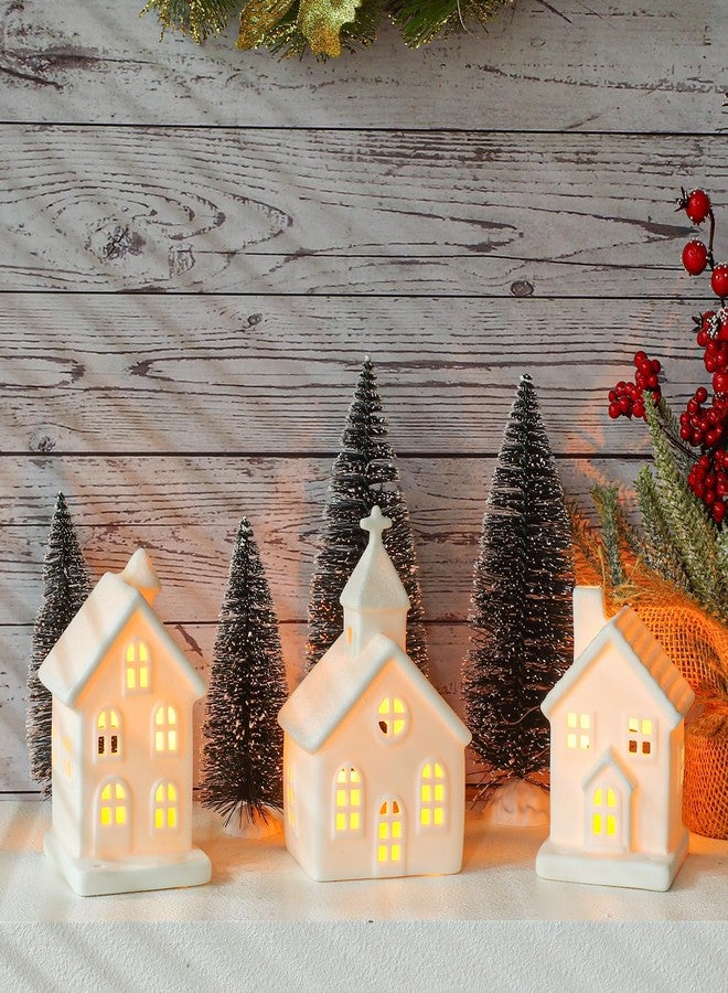 Peninpha 7PCS Christmas Village Sets - 3 LED Lighted Ceramic White Houses with 4 Decorative Christmas Trees Remote Control Led Candles for Xmas Home Tabletop Mantel Shelf Decor - Image 1